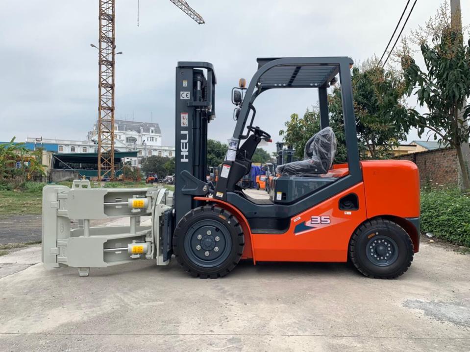 Bộ kẹp giấy cuộn lắp trên xe nâng Heli